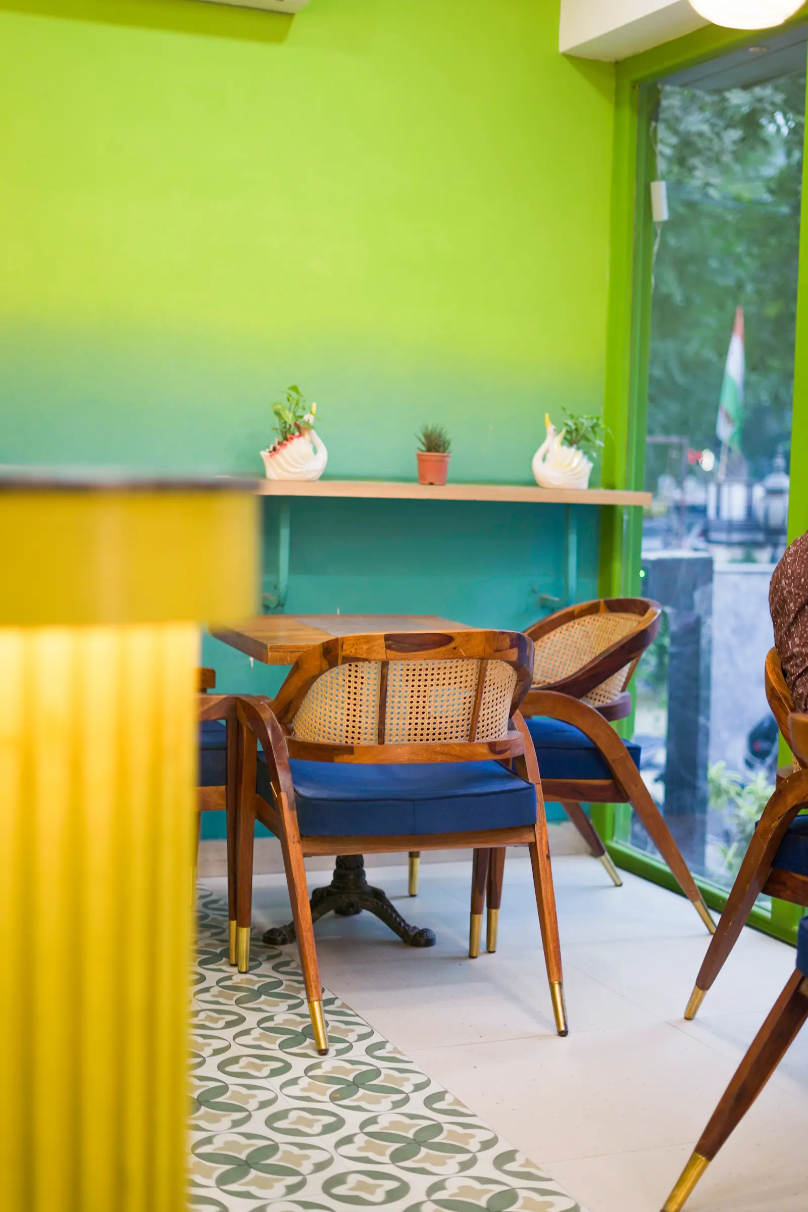 Window seating area at Blu Turkey Cafe in Delhi