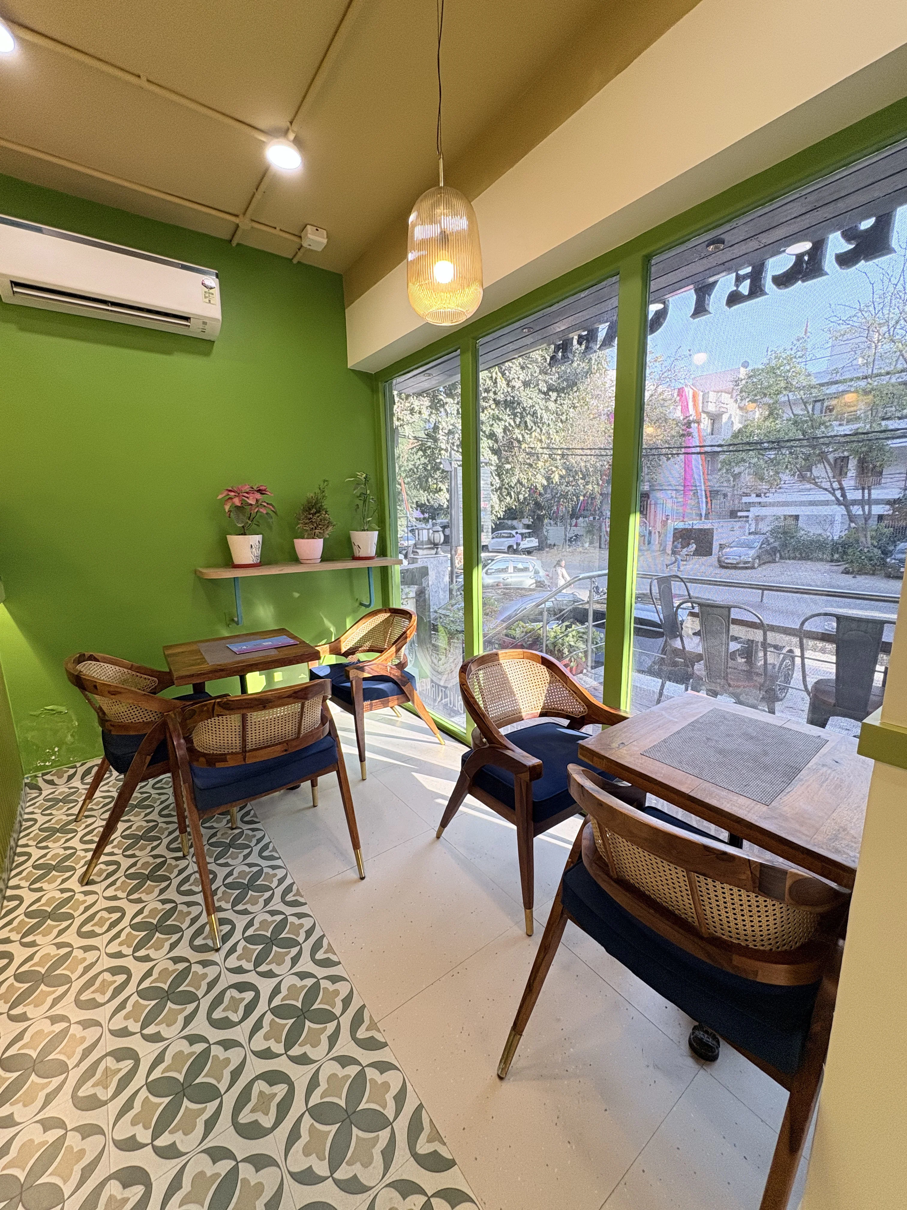 Window seating area at Blu Turkey Cafe in Delhi